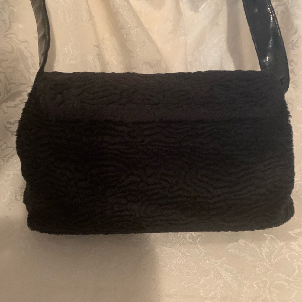 Carlo D’Santi shoulder bag.